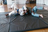 Men Lying on the Floor