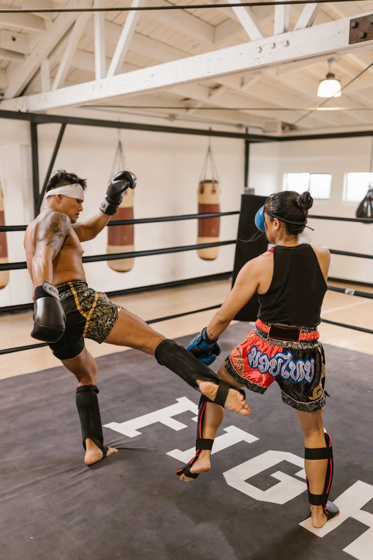 Man And Woman Boxing