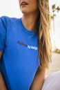 Close Up Photo of a Blond Woman in Blue Shirt