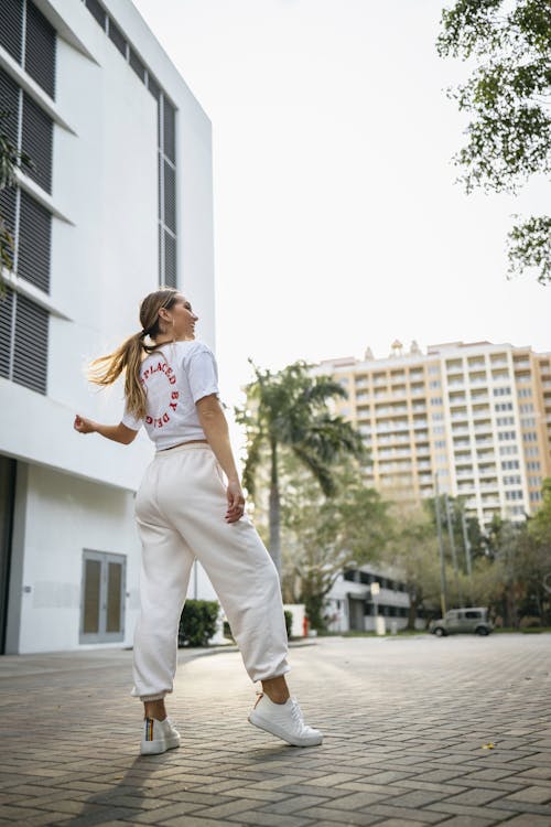 Blonde Woman in T-shirt in Town