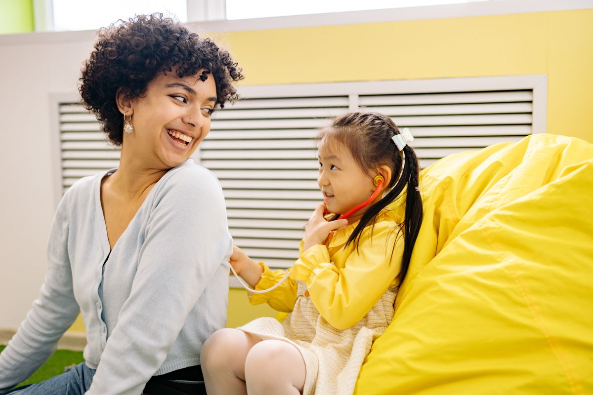 Child focused on a Montessori activity