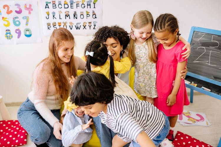 Children Showing Love For Their Teacher