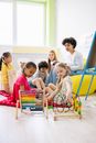 Children Learning To Use The Abacus