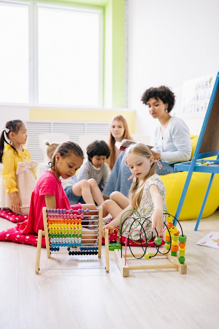 Children Learning To Use The Abacus