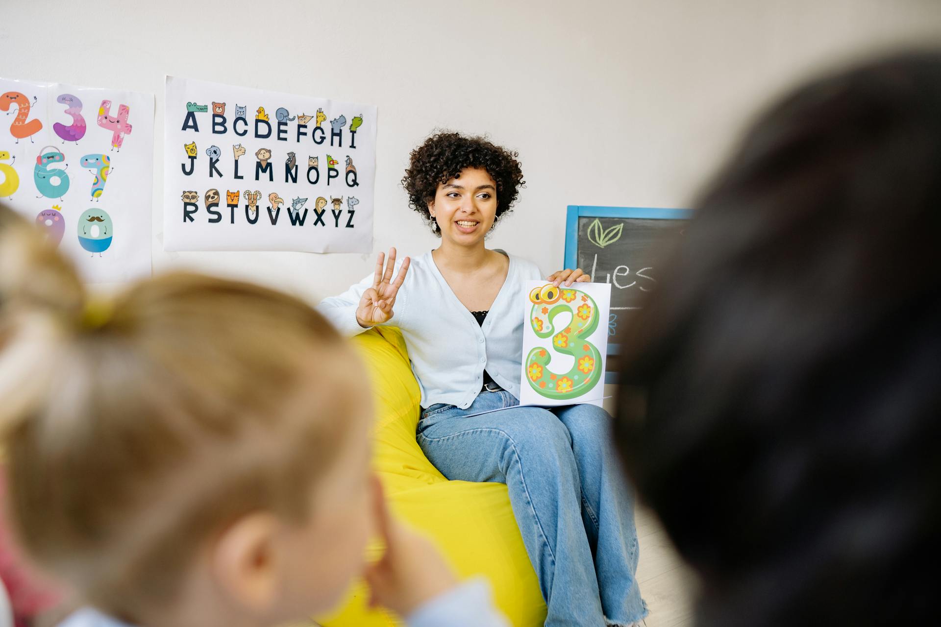 A Woman Teaching Kids