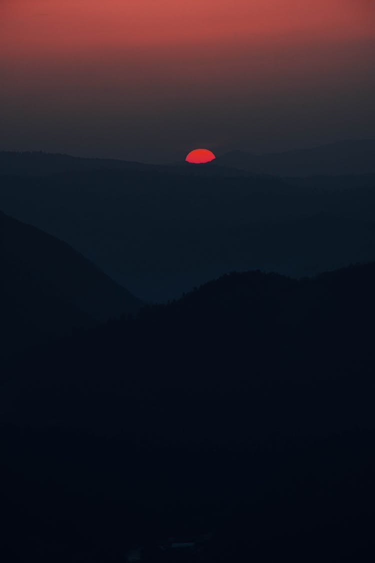 Silhouette Of Hills At Sunset