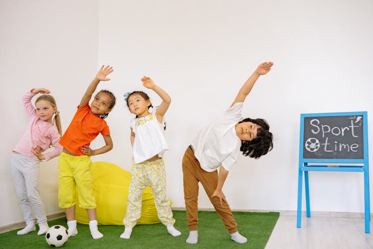 Active Kids Doing Bending Exercise