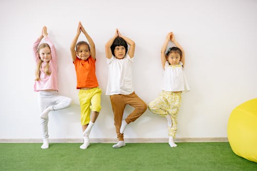 Free Kids Standing Near A Wall In A Ballet Position Stock Photo