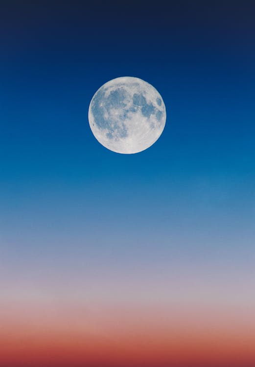 Free Full Moon on a Blue Sky  Stock Photo
