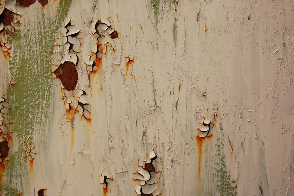 Close-up of severely corroded bulkhead showing rust, cracks, and water damage - bulkhead replacement near me Close-up of severely corroded bulkhead showing rust, cracks, and water damage - bulkhead replacement near me