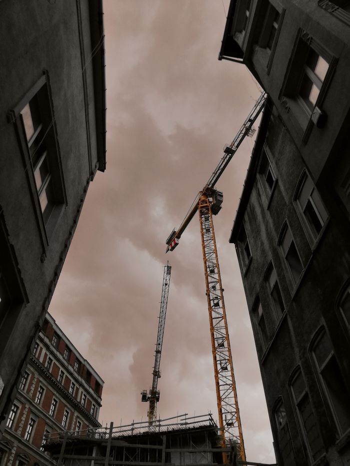 Tower crane between buildings
