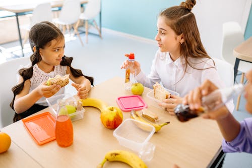 Children Eating on a Table