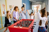 Teacher Playing Table Games with Students