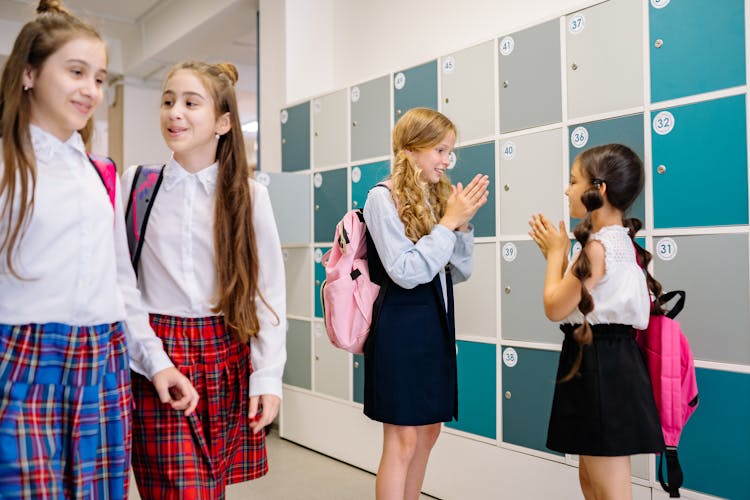 Girls Playing At The Hallway