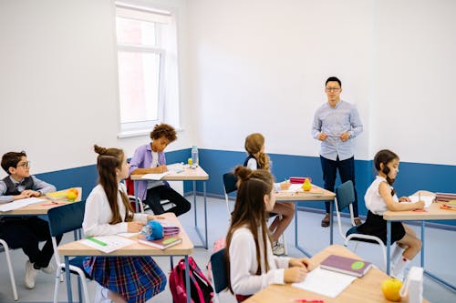 Teacher Teaching inside the Classroom