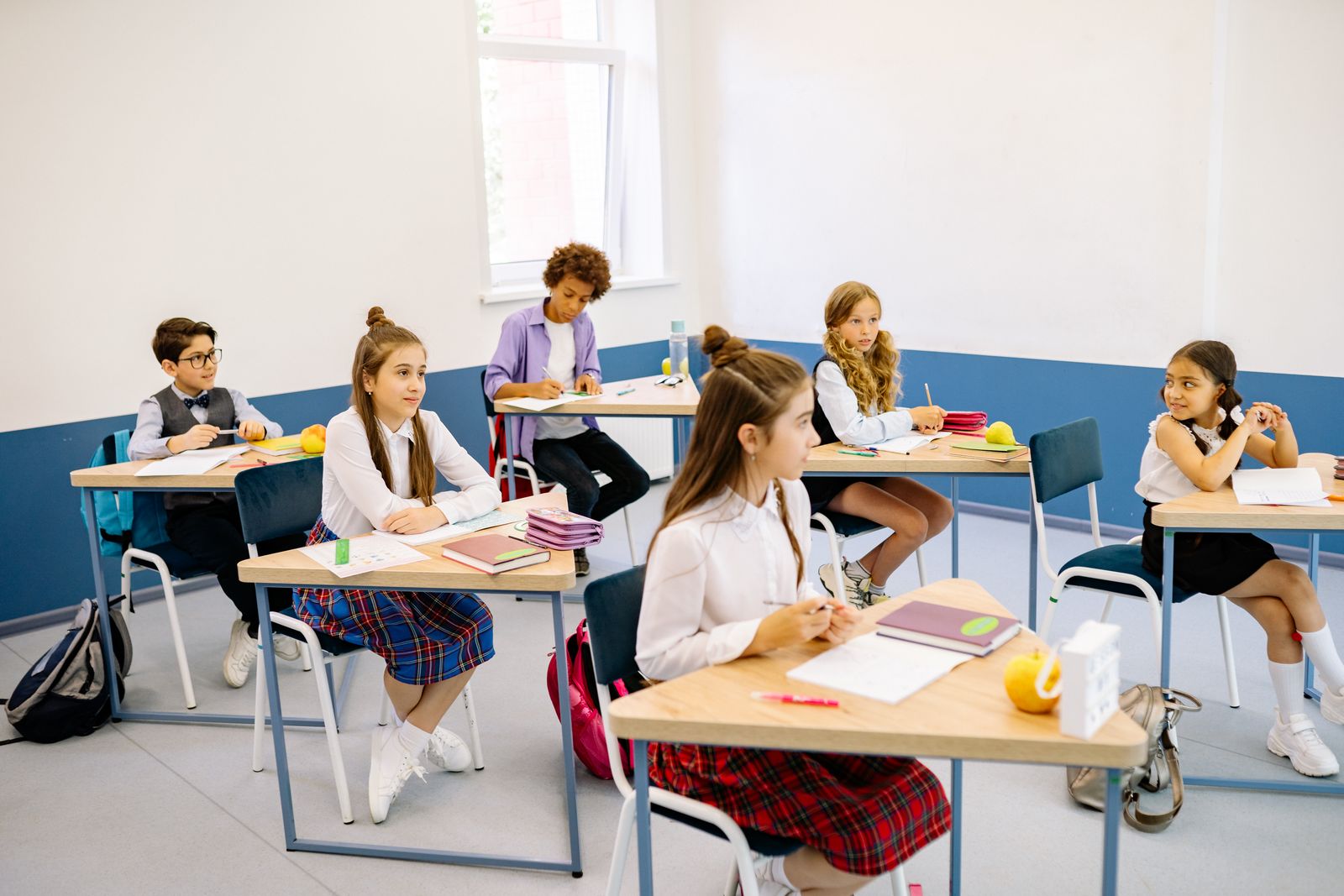 Students learning in a bright classroom