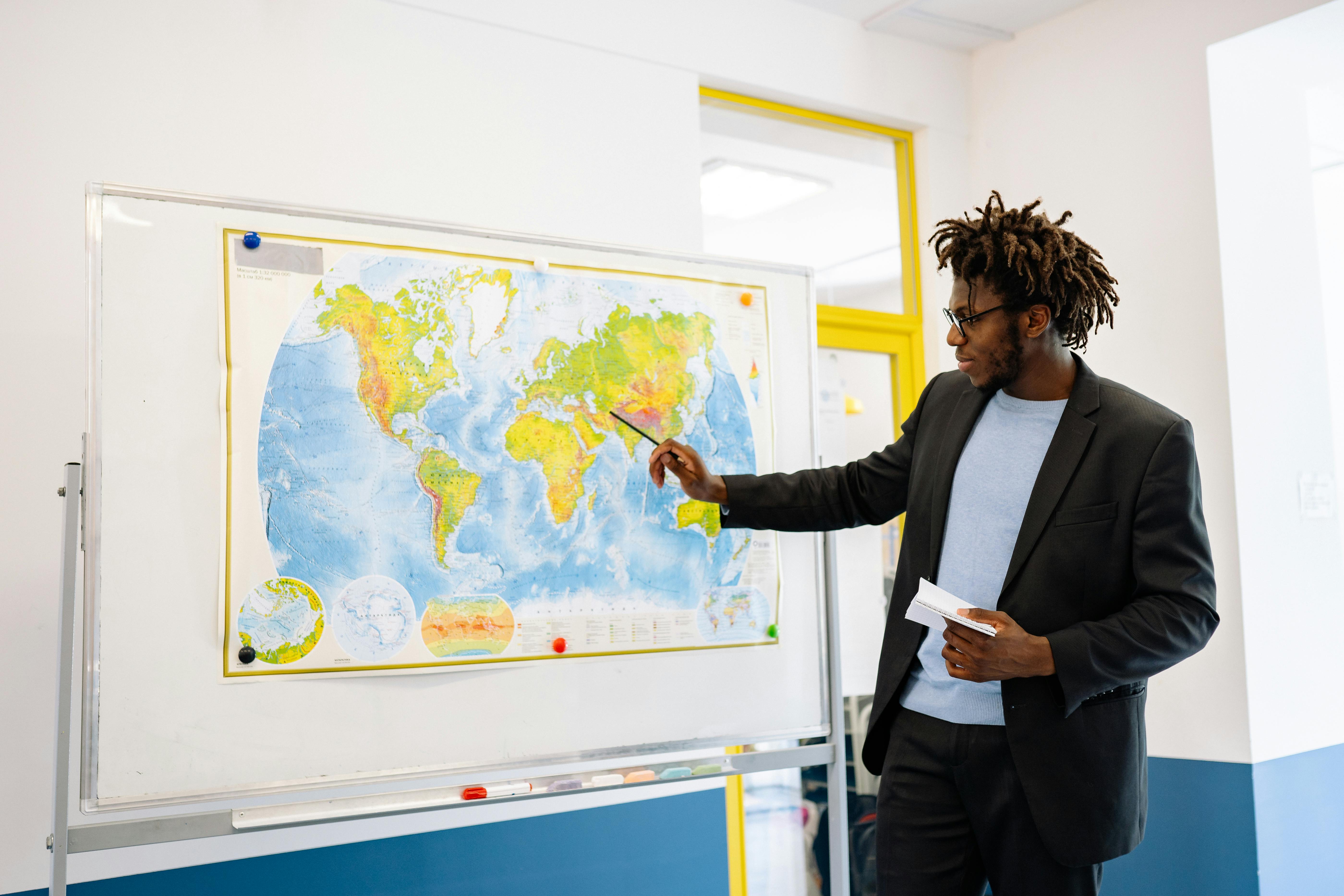Free Man Teaching About the World Stock Photo