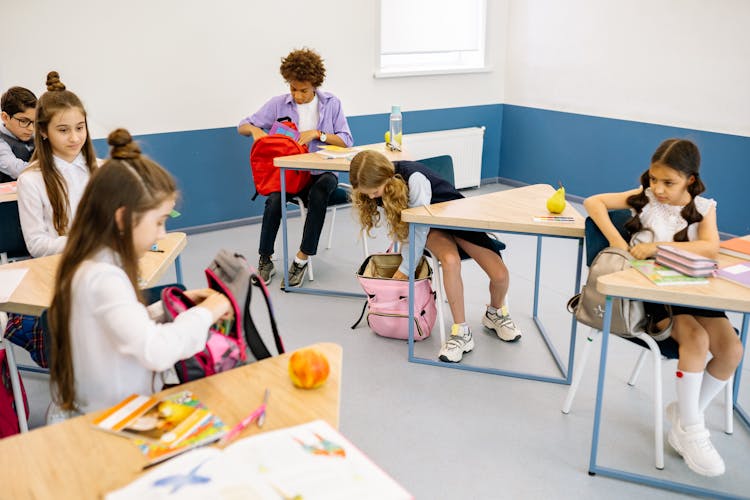 Pupils Sitting Inside The Classroom