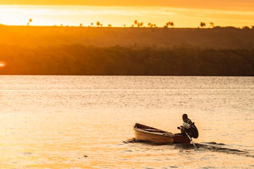 Fisherman riding Boat