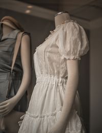 White dress on a mannequin — photo by Chris F on Pexels