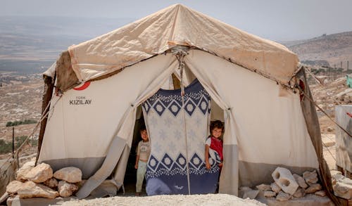 Children in the Tent's Entrance
