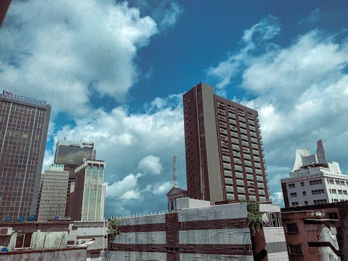 Free stock photo of city center, cloud, high rise building Stock Photo