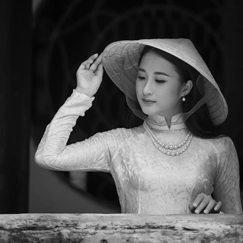 Beautiful Woman Wearing Hat Looking Down