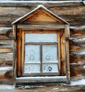 Window of a Wooden House with Hand Marks