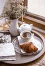 White Ceramic Teacup on White Ceramic Saucer