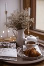White Ceramic Mug on White Table Cloth