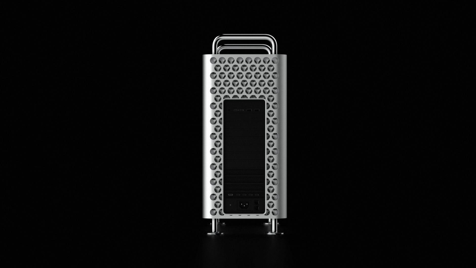 High-resolution image of a modern Apple desktop computer with aluminum chassis and distinctive cheese grater design.