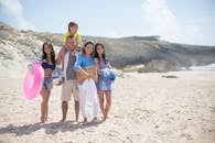 4 Women Standing on White Sand