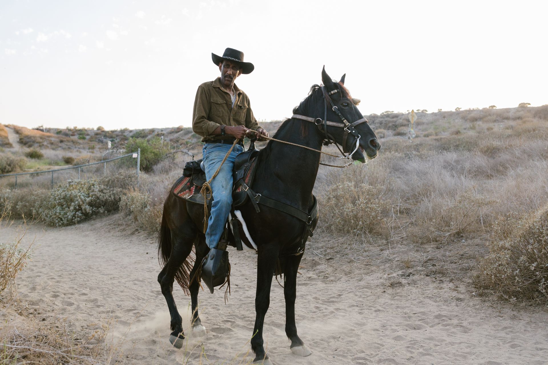 Man Riding a Horse