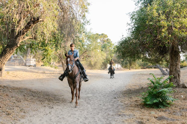 People Riding On Horses