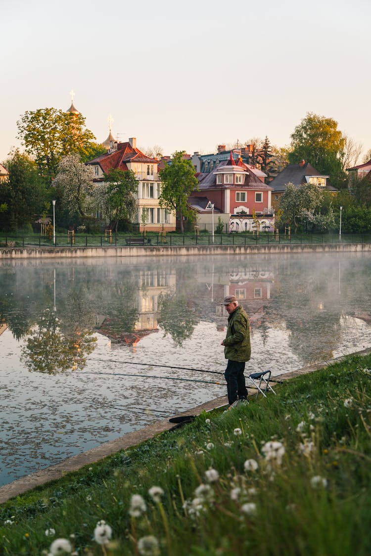 Man Fishing On A River