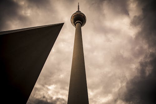 Concrete Tower Under Cloudy Sky