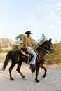 Man Riding a Horse