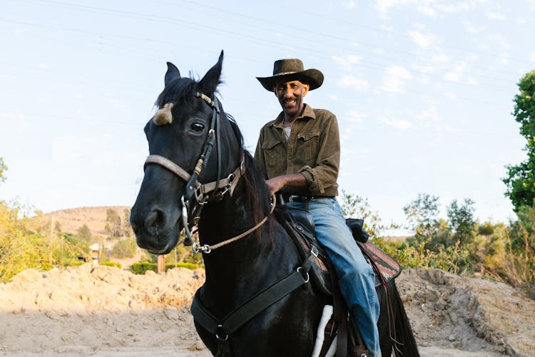 A Man Riding A Horse 