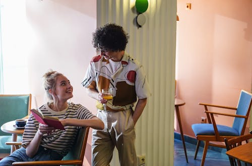 Young People Talking in a Cafe