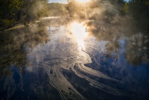 Oily Surface of a Pond and Mist 