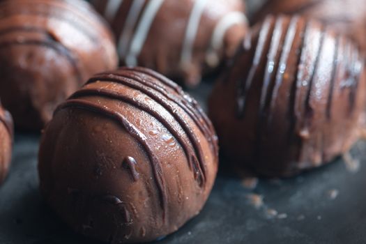 Delicious homemade chocolate truffles with a rich, glossy finish perfect for dessert enthusiasts.