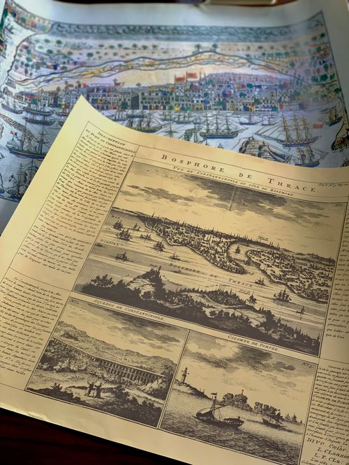 Free From above of aged newspaper sheets with white and black illustrations and inscriptions in daytime Stock Photo