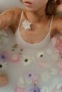Woman in White Floral Tank Top