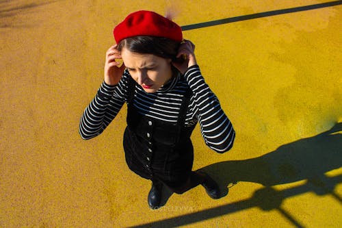 High Angle View of a Woman Wearing a Red Beret 