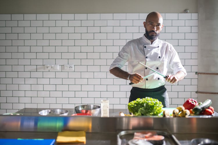 A Chef Holding A Knife