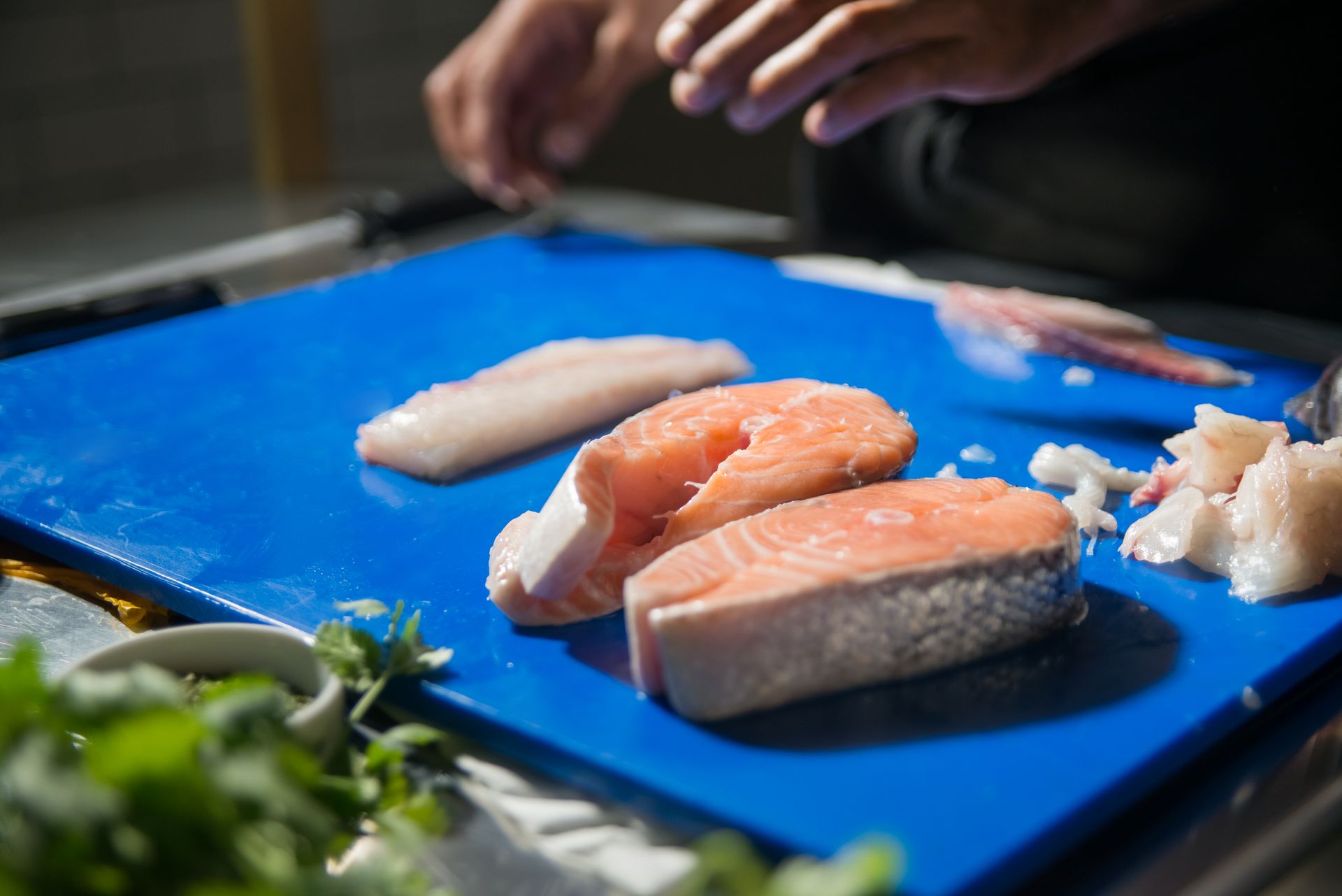Close-Up Shot of Slices of Fish on a Chopping Board