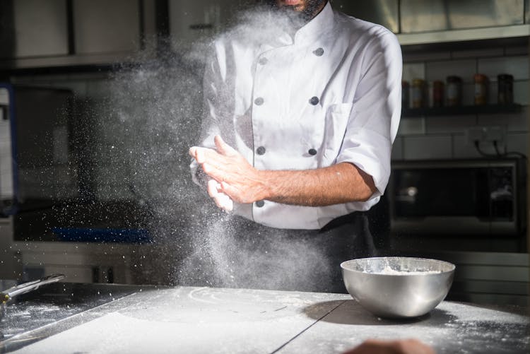 A Chef Preparing In The Kitchen