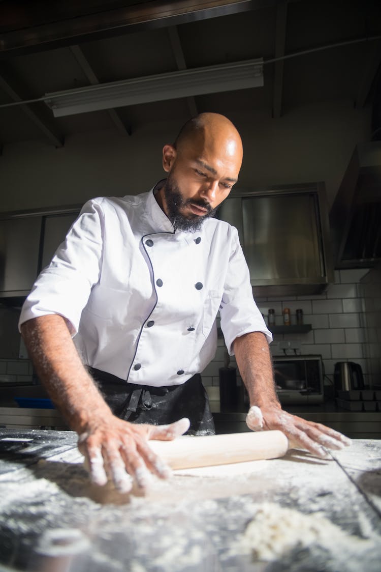 A Chef Preparing In The Kitchen