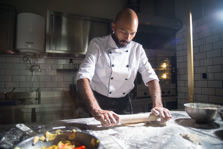 A Chef Preparing In The Kitchen