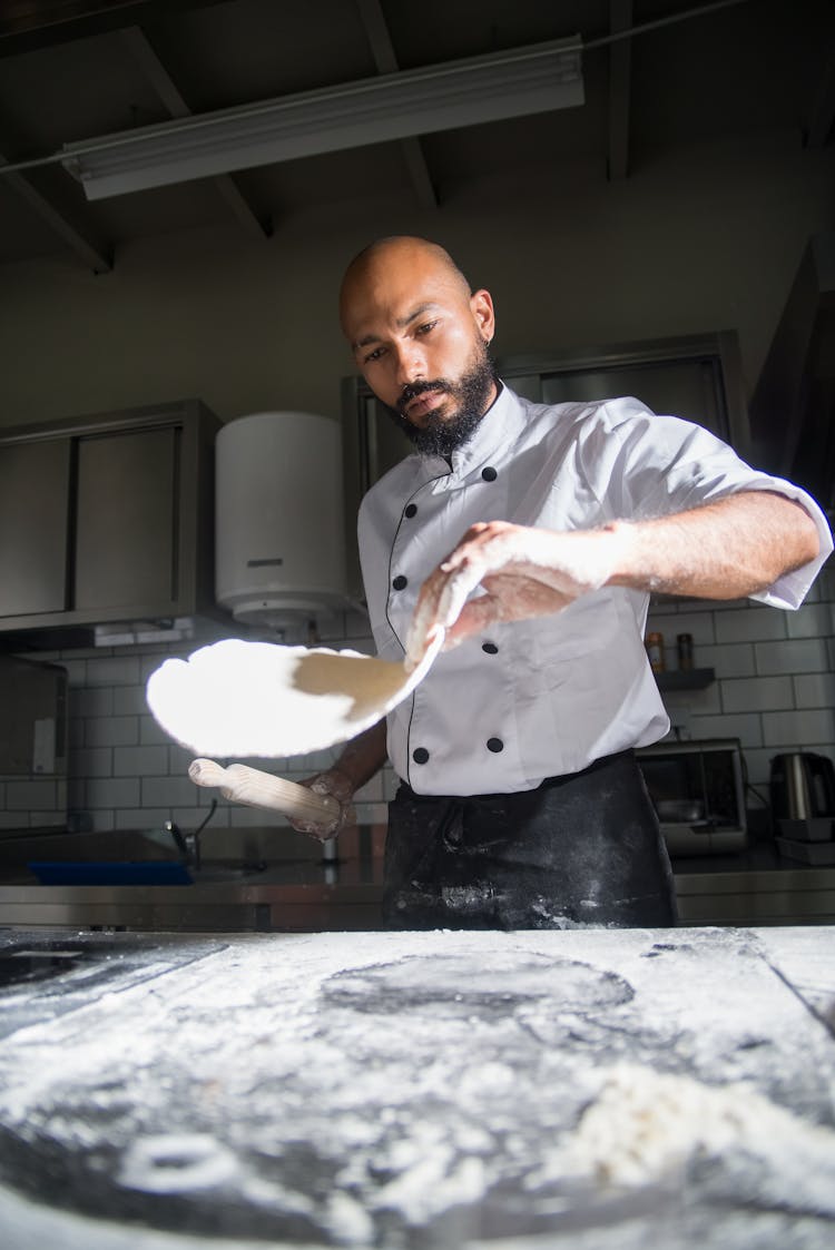 A Chef Preparing In The Kitchen